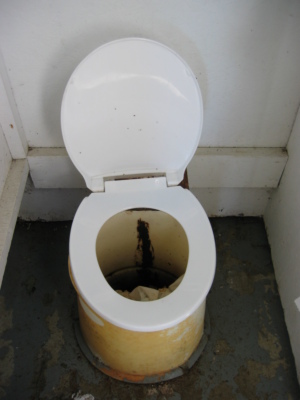 The old public pit toilet